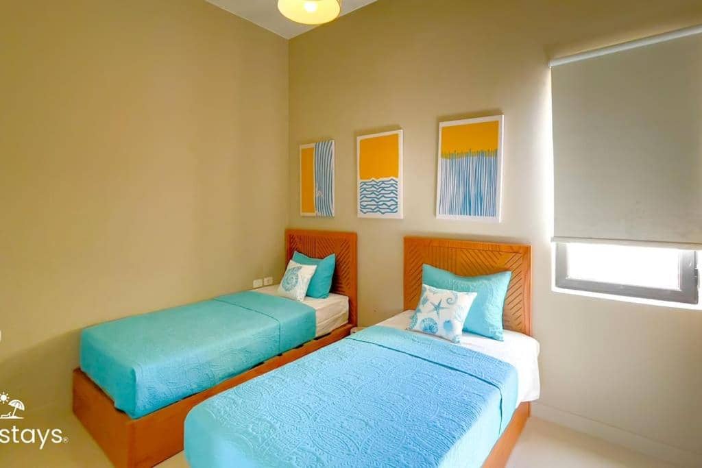 Ollystays Scenic Tawila 2BR, Lagoon & Shared Pool View! — 2